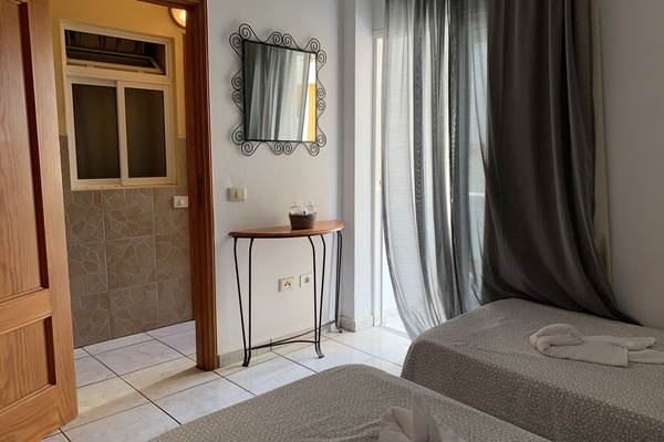 Twin Room, Private Bathroom | Free WiFi, bed sheets