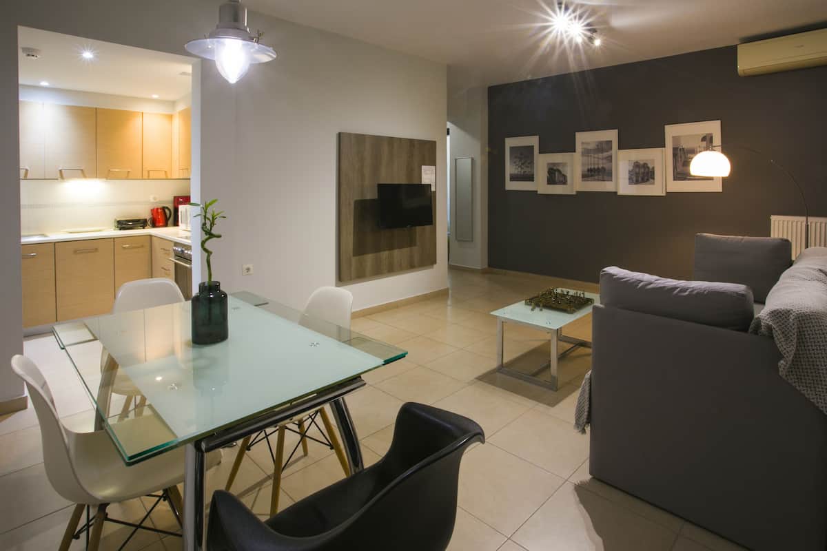 Deluxe Apartment, 2 Bedrooms | Living area | Plasma TV