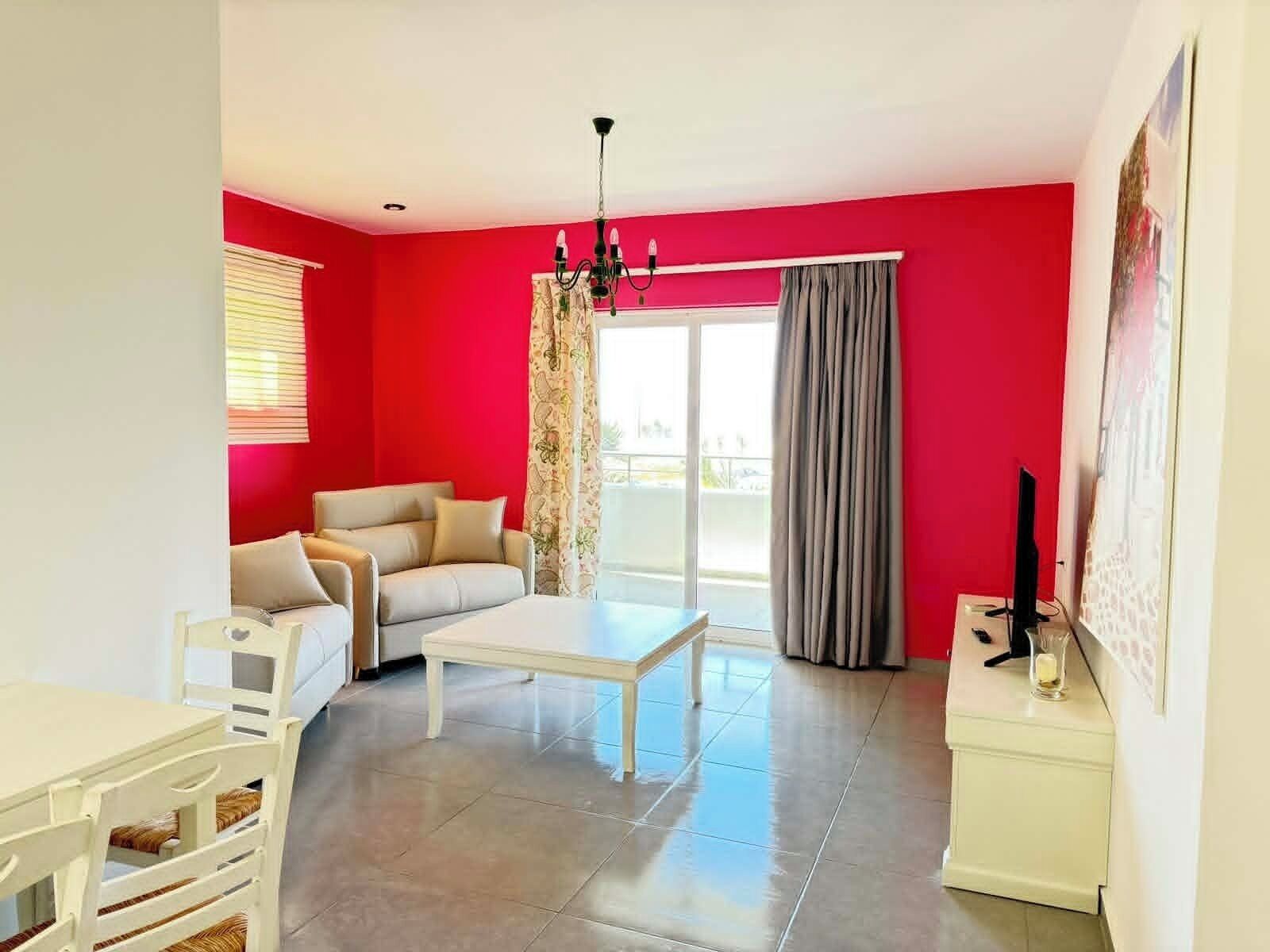 Family Suite, 1 Bedroom, Sea View | Living area | Flat-screen TV