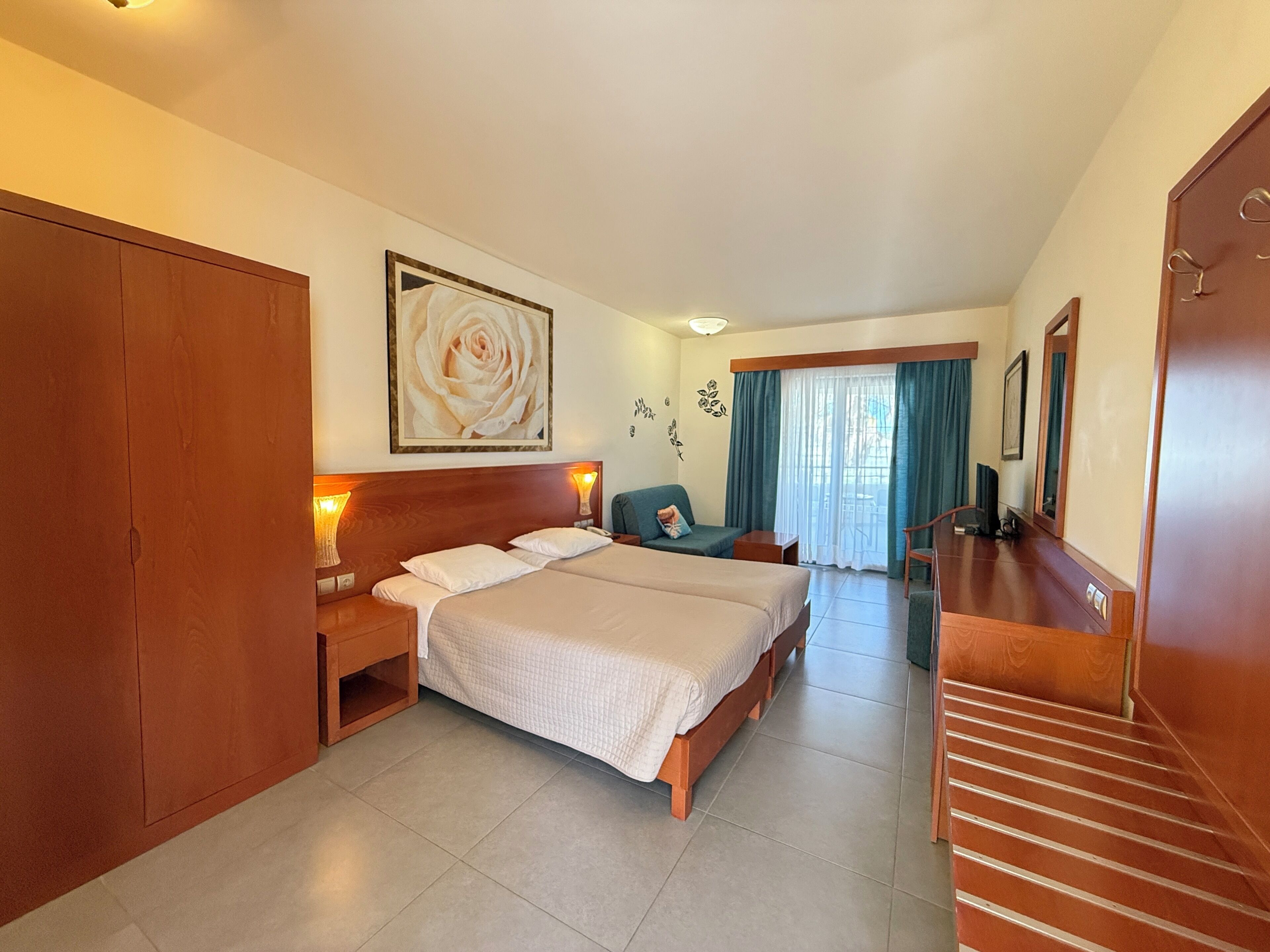 Standard Room, Partial Sea View | In-room safe, desk, iron/ironing board, free WiFi