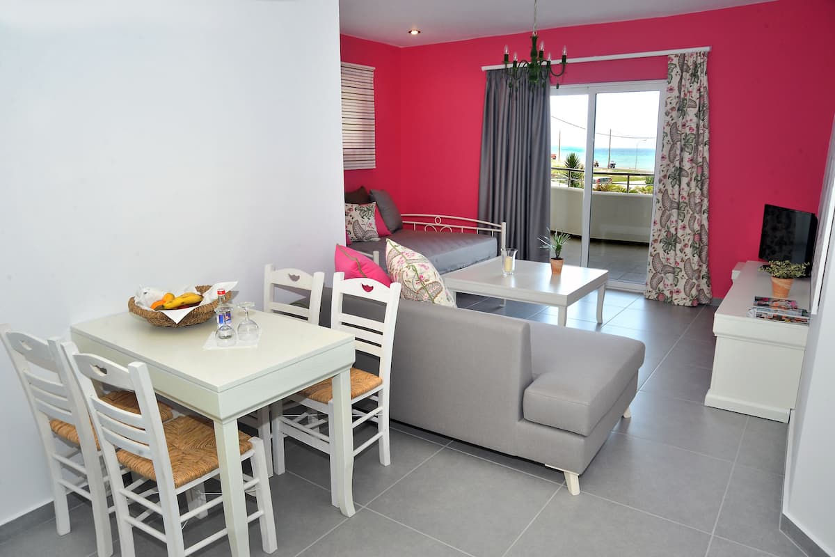 Family Suite, 1 Bedroom, Sea View | Living area | Flat-screen TV