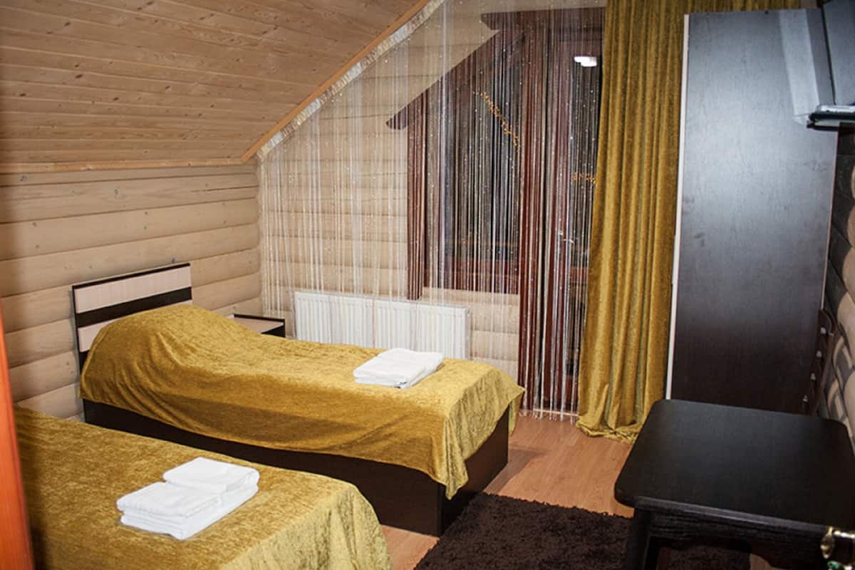 Economy kamer, 1 twee- of 2 eenpersoonsbedden, gedeelde badkamer | 1 slaapkamer, luxe beddengoed, een strijkplank/strijkijzer, gratis wifi