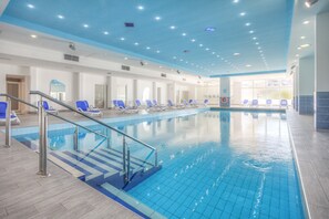 Alberca techada y alberca al aire libre por temporada