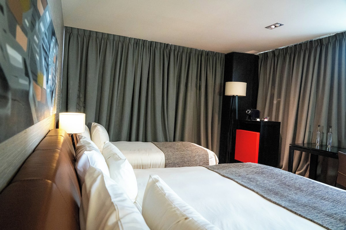Ropa de cama de alta calidad y minibar