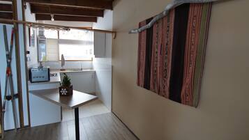 Family Bungalow | Private kitchen | Fridge, microwave, stovetop, cookware/dishes/utensils