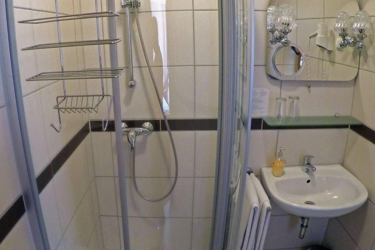 double or twin room | bathroom | shower, free toiletries, slippers, towels