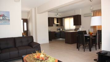 Exclusive Villa, 3 Bedrooms, Private Pool | Living area | 32-inch flat-screen TV with satellite channels, TV, fireplace