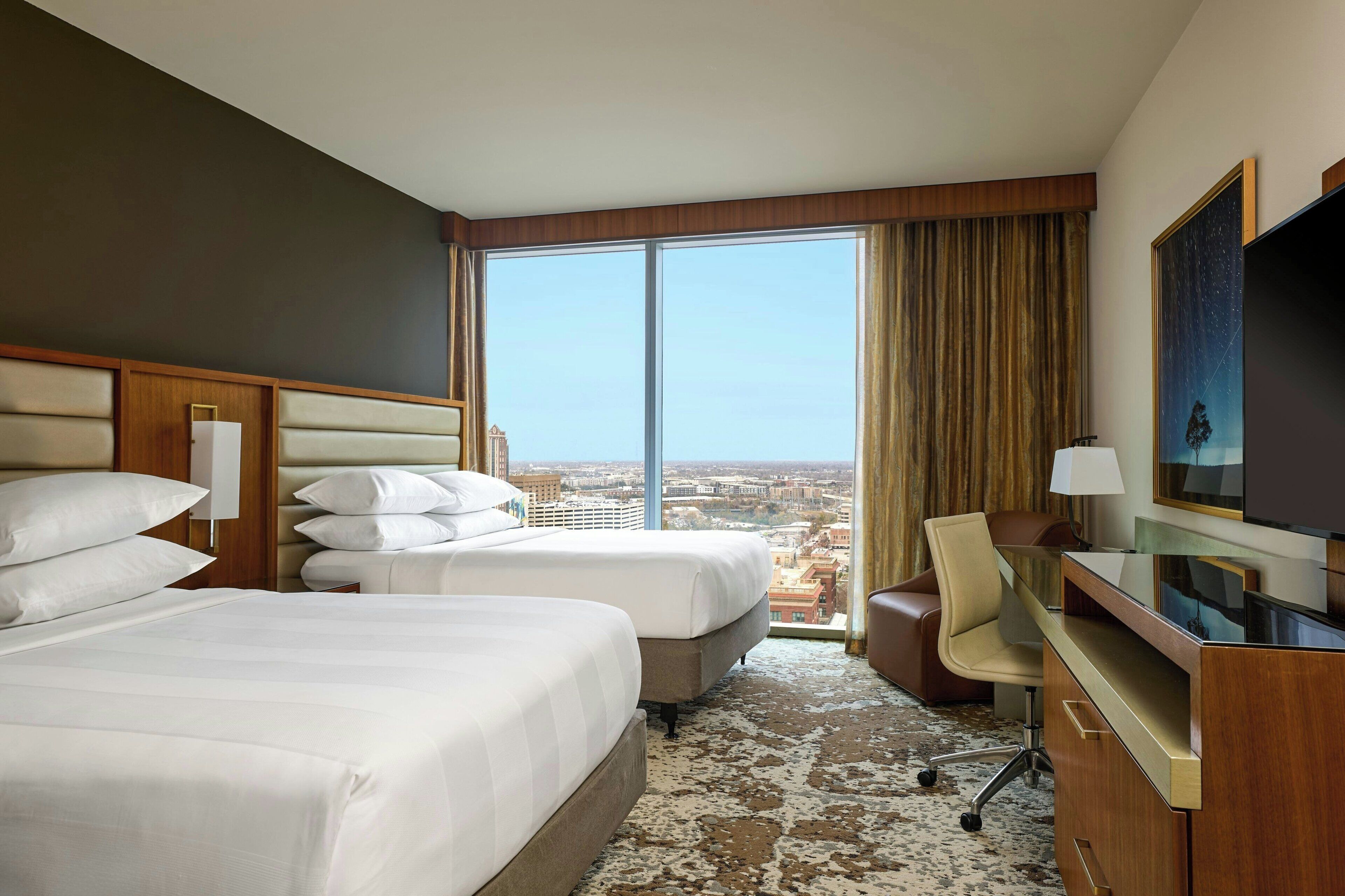 Hypo-allergenic bedding, in-room safe, desk, laptop workspace