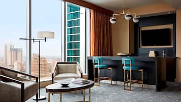 Suite, 1 King Bed with Sofa bed, Pool View | Living area | 55-inch LED TV with cable channels, TV