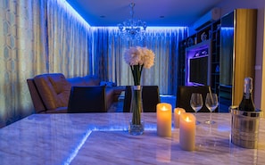 1 Bedroom Apartment | Living area | 32-inch LCD TV with cable channels, TV
