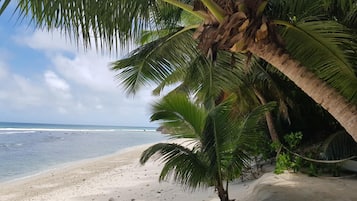 Playa privada y playa de arena blanca