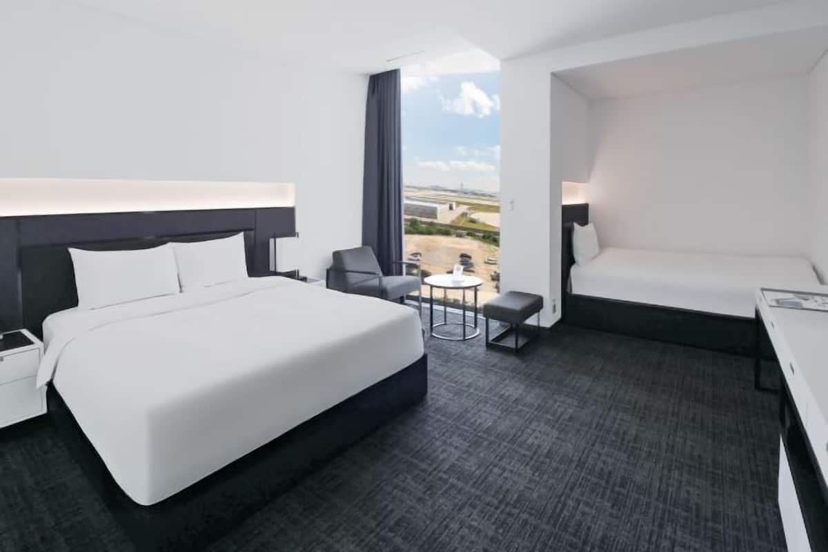 Premium bedding, desk, iron/ironing board (on request), WiFi (free)