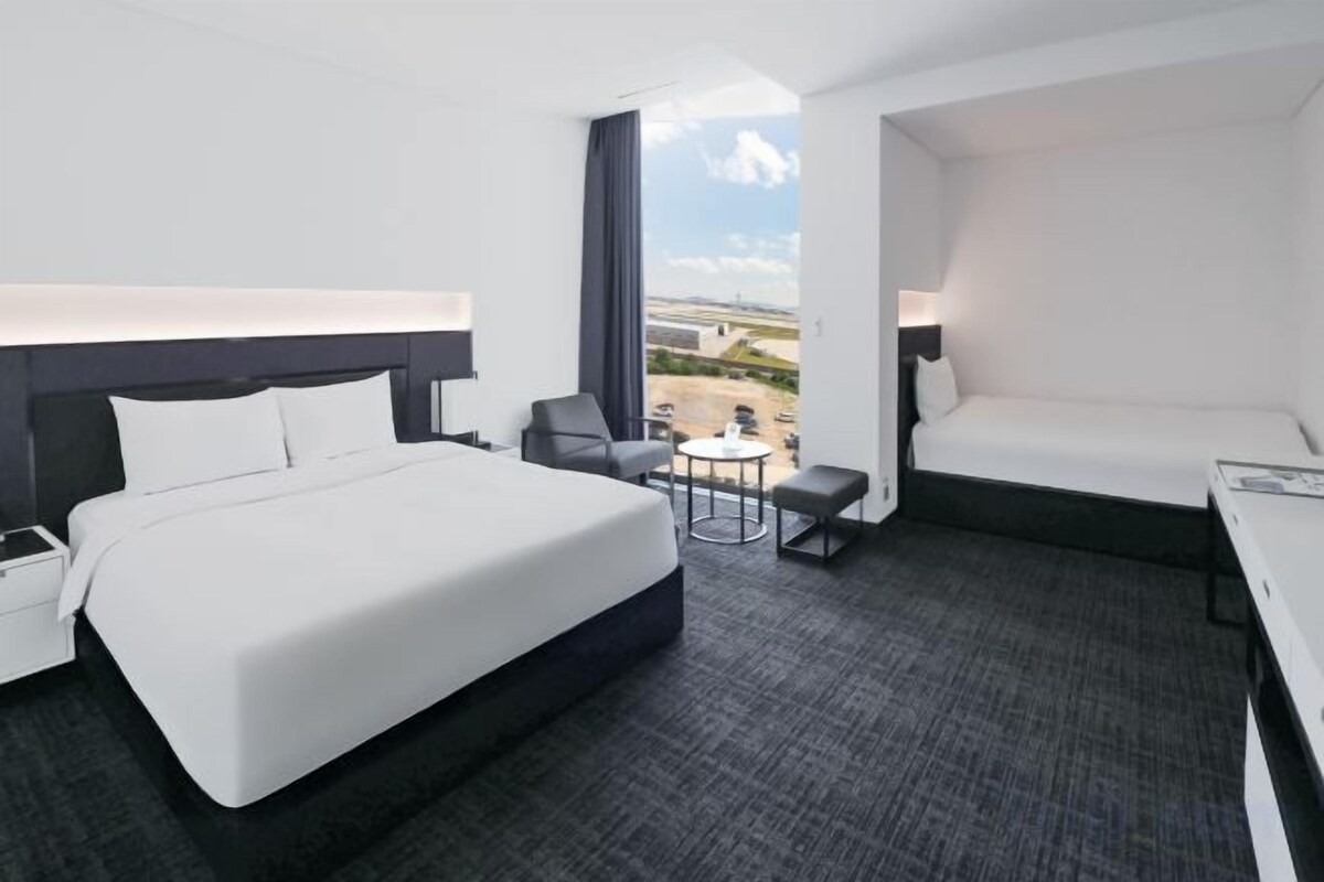 Premium bedding, desk, iron/ironing board (on request), WiFi (free)