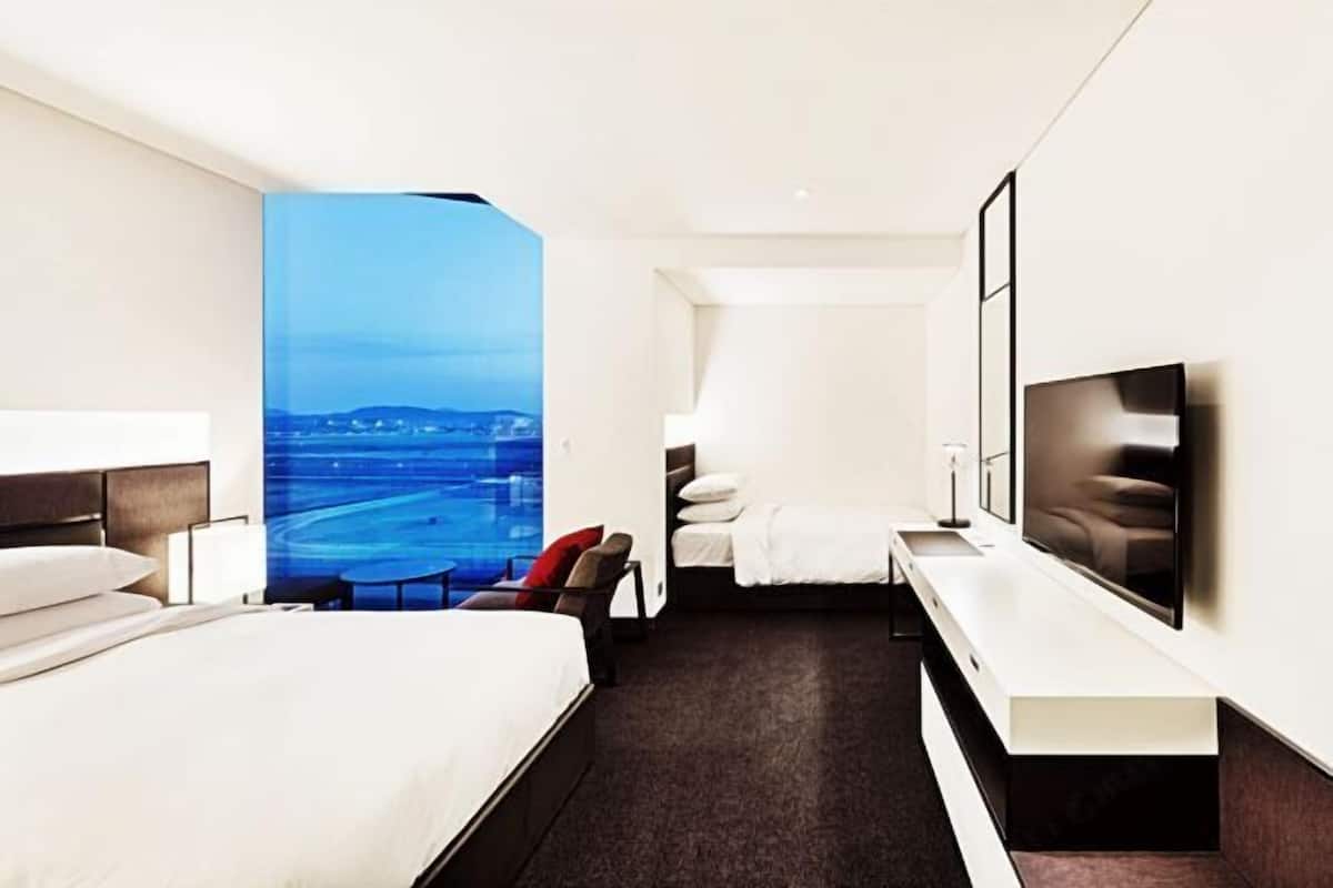 Premium bedding, desk, iron/ironing board (on request), WiFi (free)