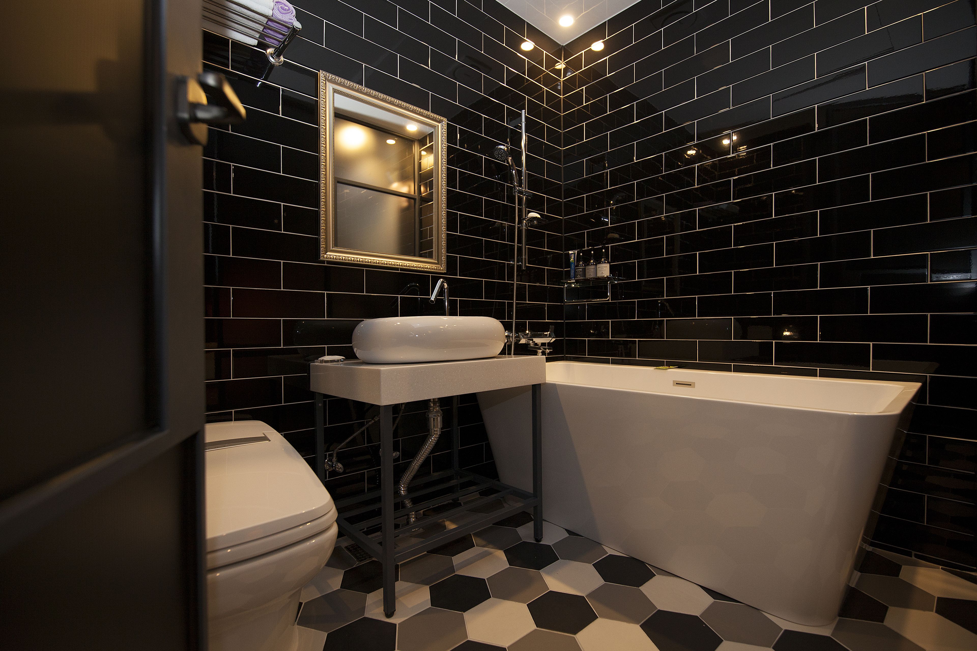 deep-soaking bathtub, free toiletries, hair dryer, bathrobes