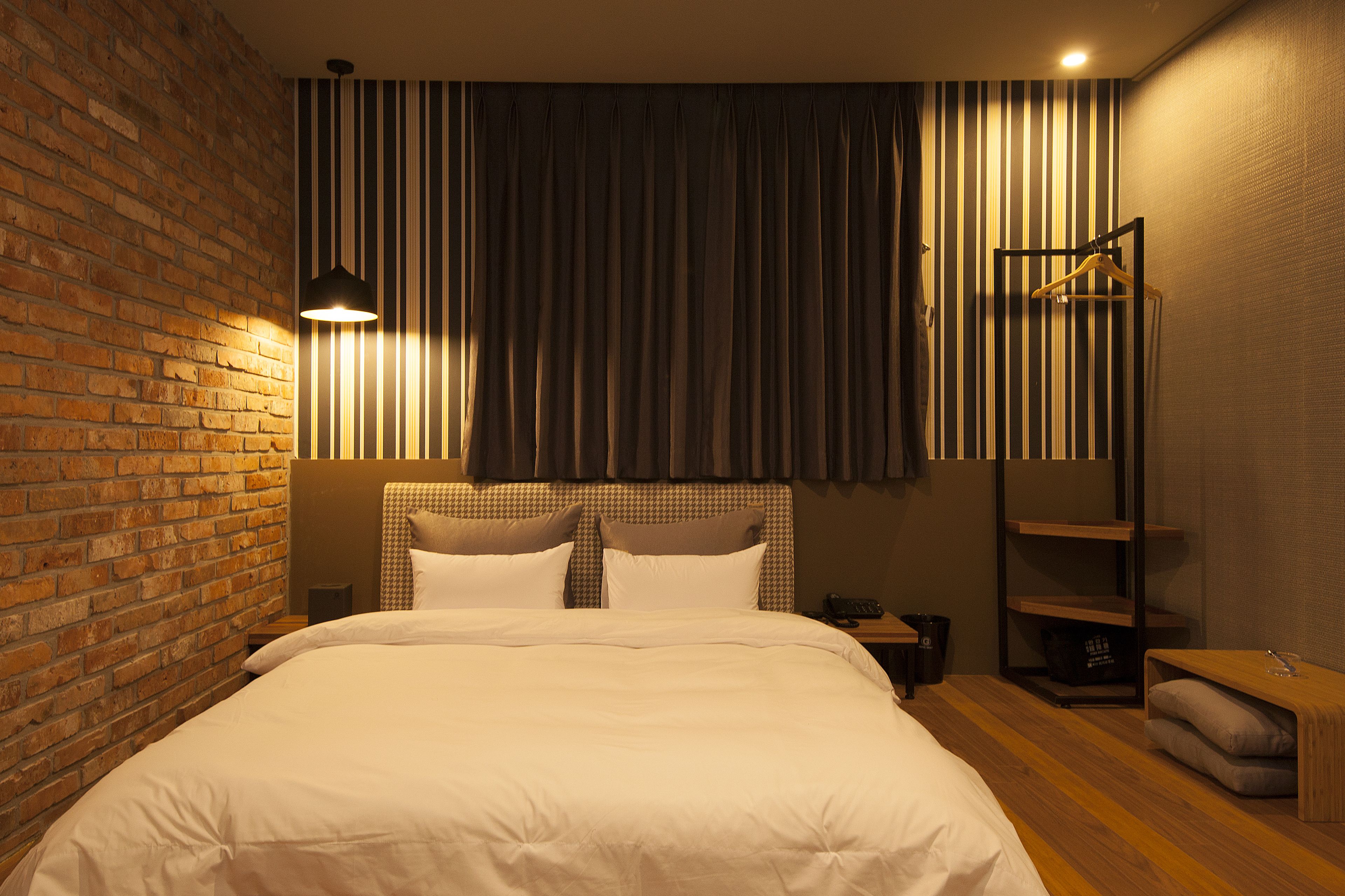 pillow-top beds, individually decorated, desk, blackout curtains