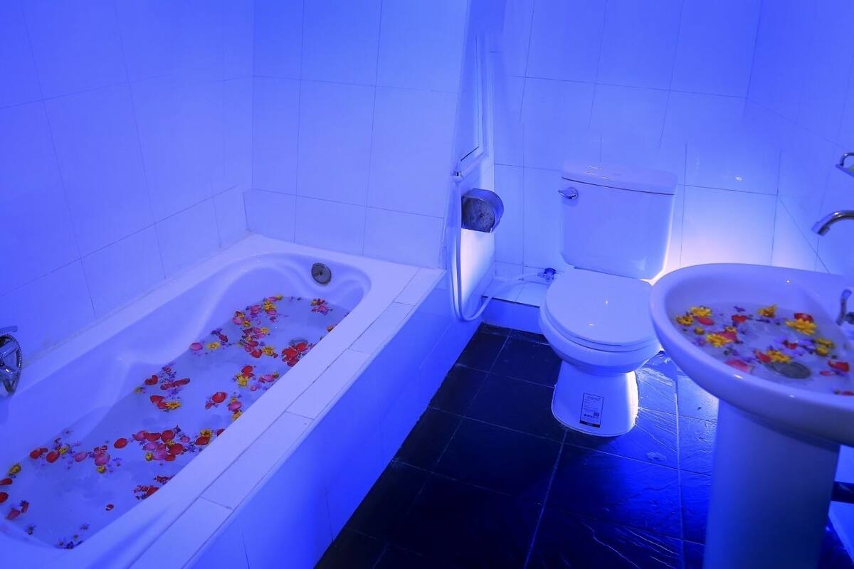 shower, free toiletries, slippers, towels