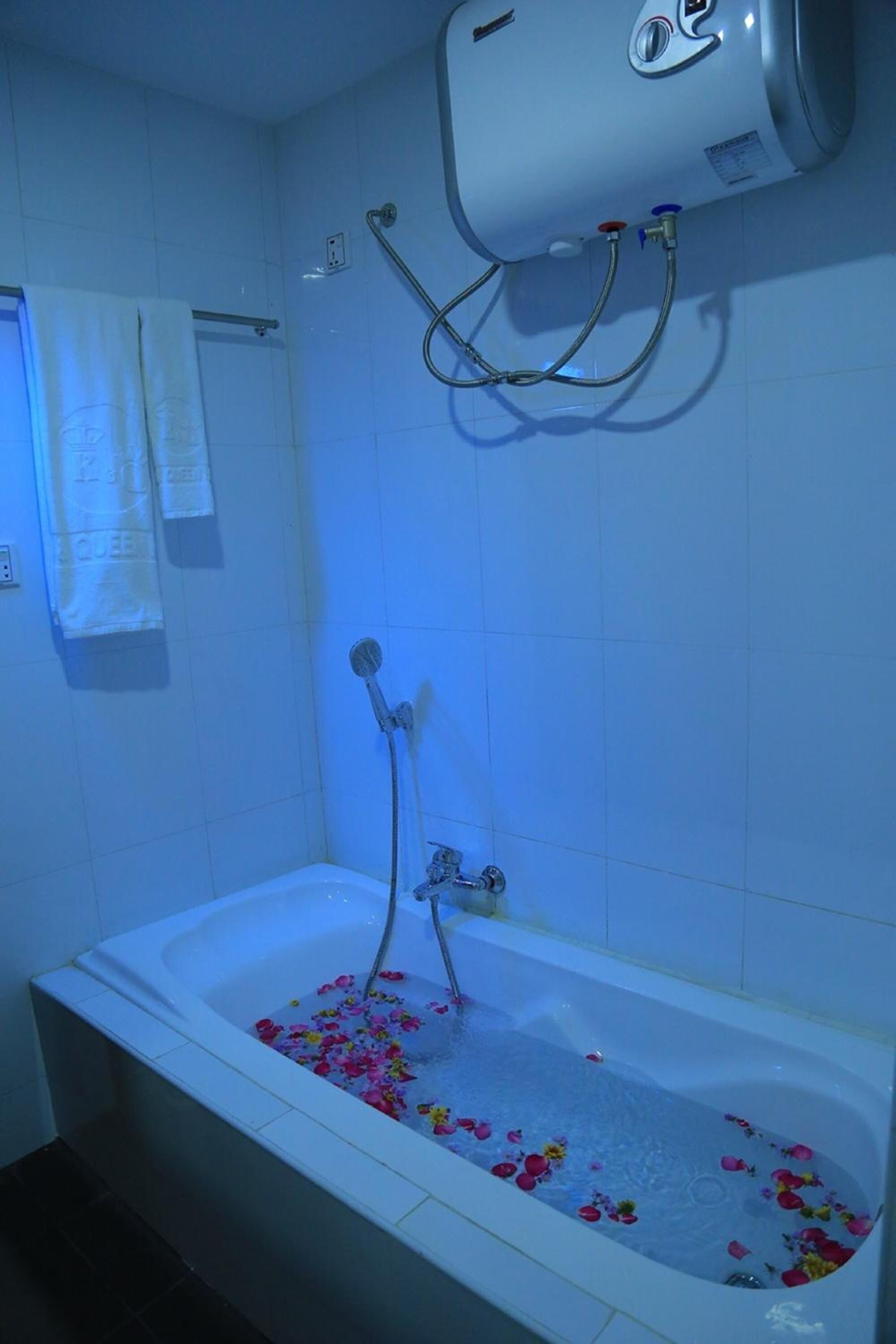 shower, free toiletries, slippers, towels