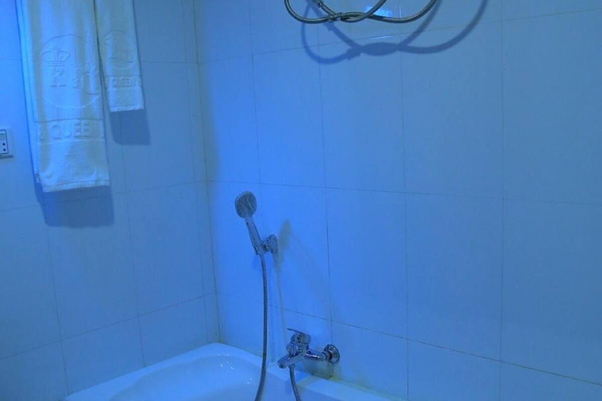 shower, free toiletries, slippers, towels