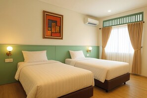Deluxe Twin Room | Desk, blackout curtains - Rumabatavi The Tavia (Jakarta)
