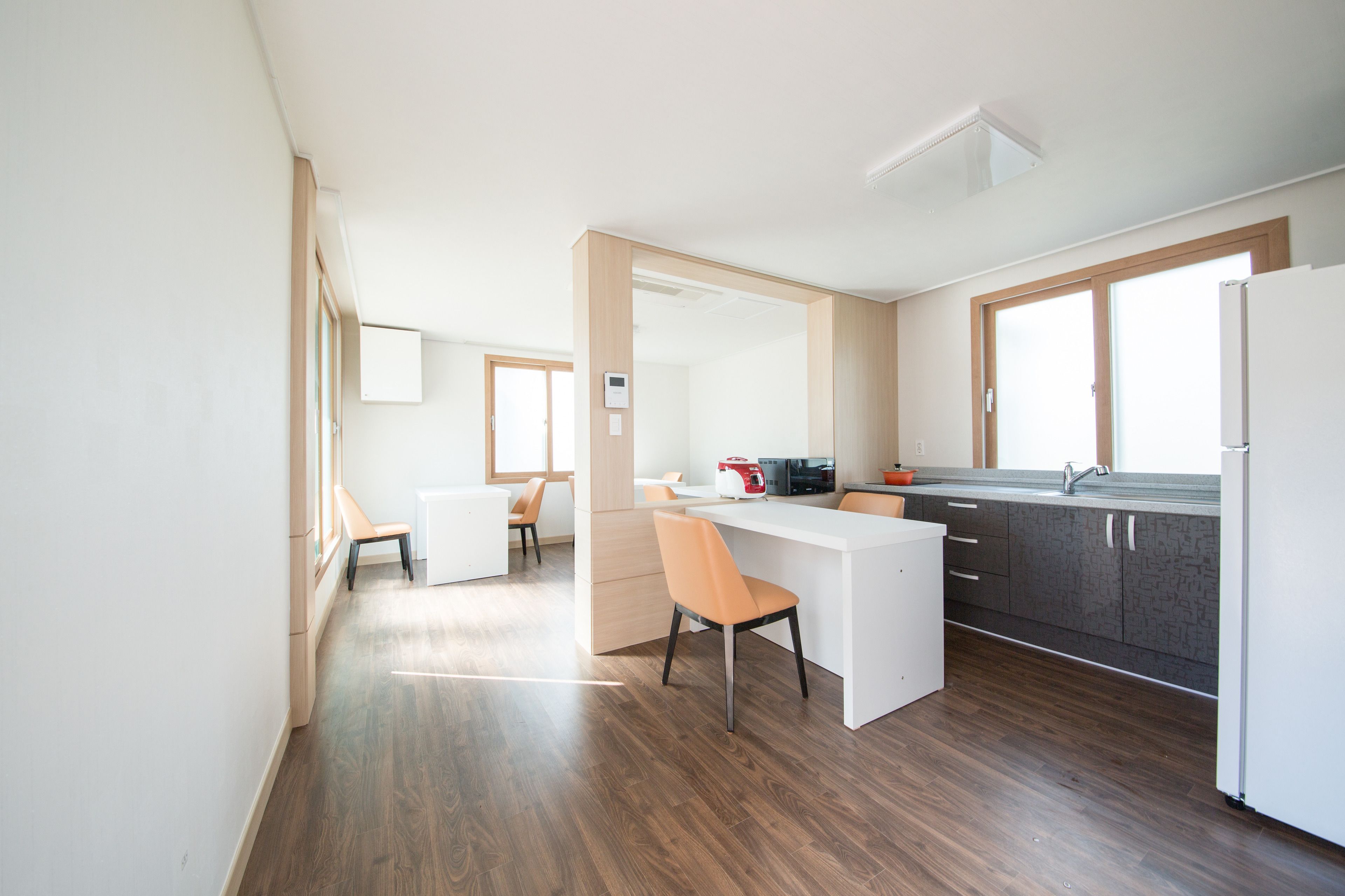 fridge, microwave, coffee/tea maker, cookware/dishes/utensils