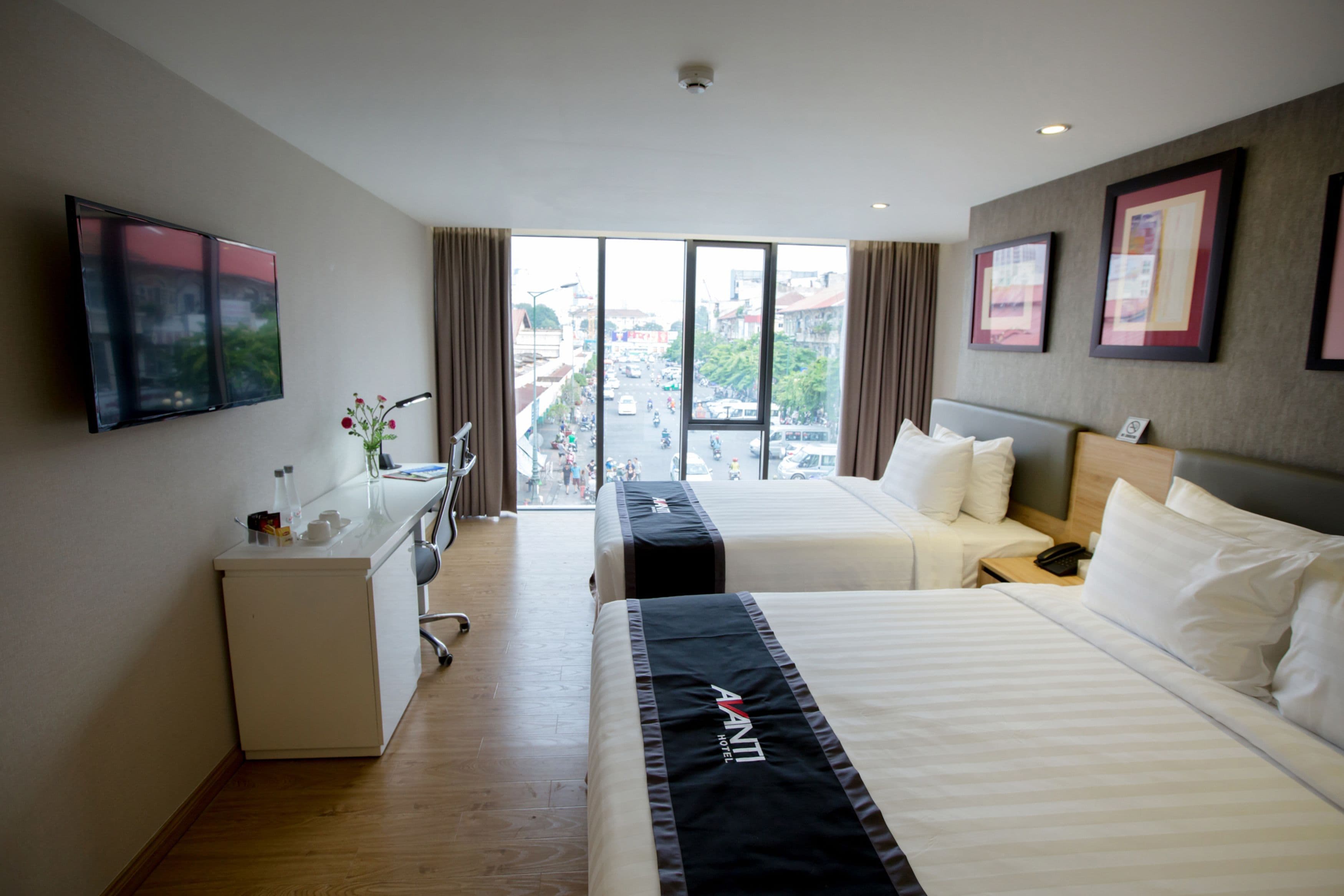 premier triple room | minibar, in-room safe, desk, blackout curtains