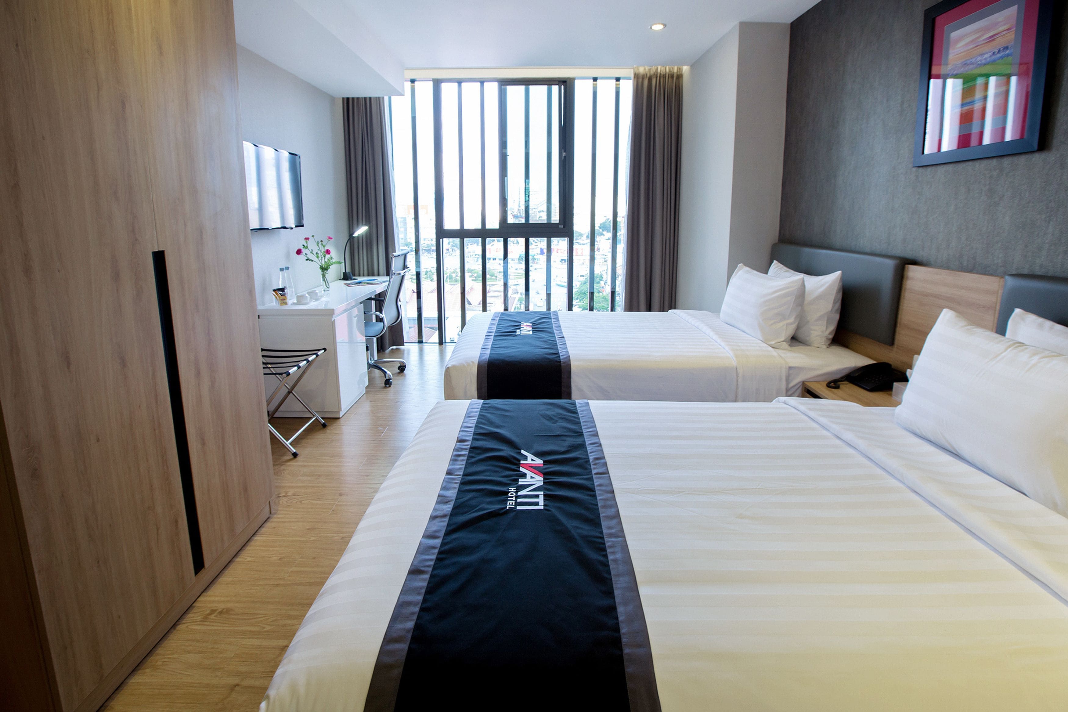 premier twin room | minibar, in-room safe, desk, blackout curtains