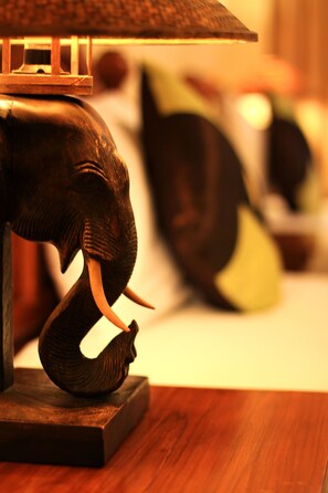 A wooden elephant sculpture on a table. - Aonang Goodwill Hotel (Krabi)