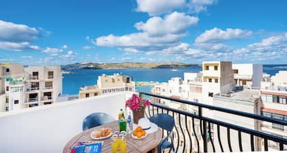 Seashells 2 bedroom Apartment with sunny terrace with stunning panoramic sea views by Getaways Malta