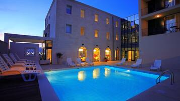 Seasonal outdoor pool, pool umbrellas, pool loungers