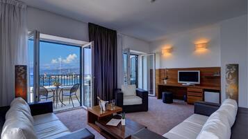 Family Suite, 1 Bedroom, Sea View (2 Adults + 2 Children) | 1 bedroom, minibar, in-room safe, desk