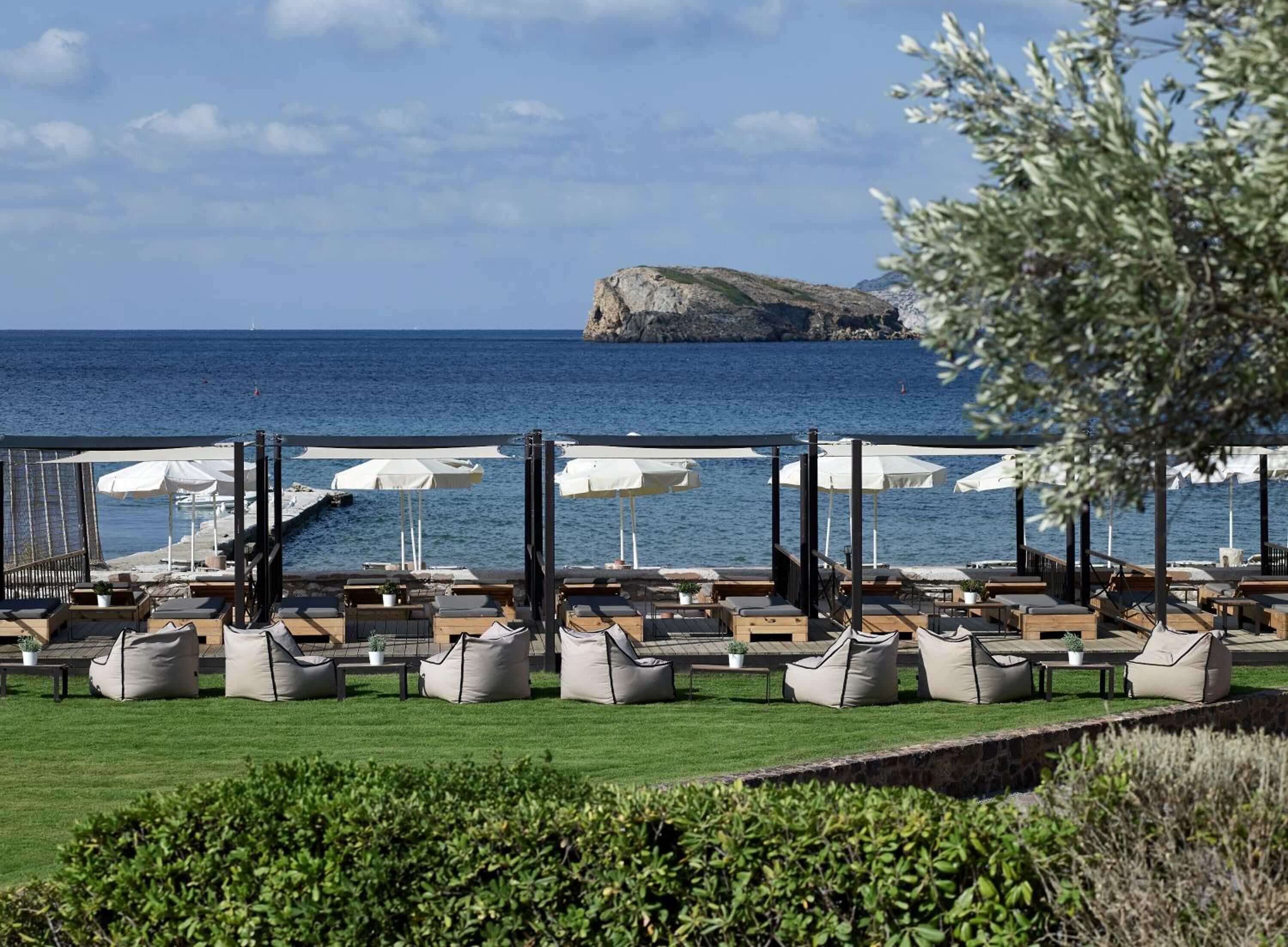 on the beach, white sand, sun-loungers, beach umbrellas