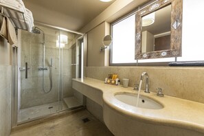 Triple Room, Garden View | Bathroom | Rainfall showerhead, free toiletries, hair dryer, bathrobes - Aegeon Beach Hotel (Lavreotiki)