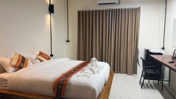Family Room, Pool View | Desk, laptop workspace, WiFi (free), individually decorated