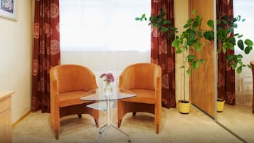 Standard Quadruple Room, Private Bathroom, Garden View | Living area | Flat-screen TV