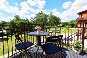 Deluxe Apartment, Private Bathroom, Garden View | Balcony - Trakaitis (Trakai)