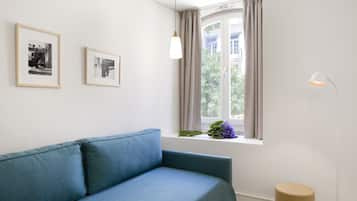 Deluxe Studio, City View | In-room safe, soundproofing, iron/ironing board, cots/infant beds