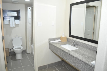 Shower, free toiletries, towels. Trinity Suites Downtown Dallas