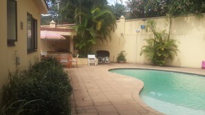 Outdoor pool, pool umbrellas, pool loungers