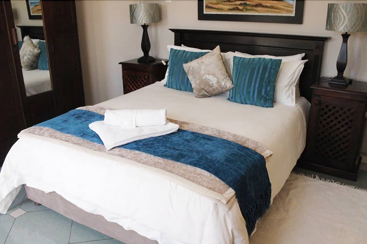 Cost Saver Room (En-suite Shower only) | In-room safe, individually decorated, individually furnished, desk