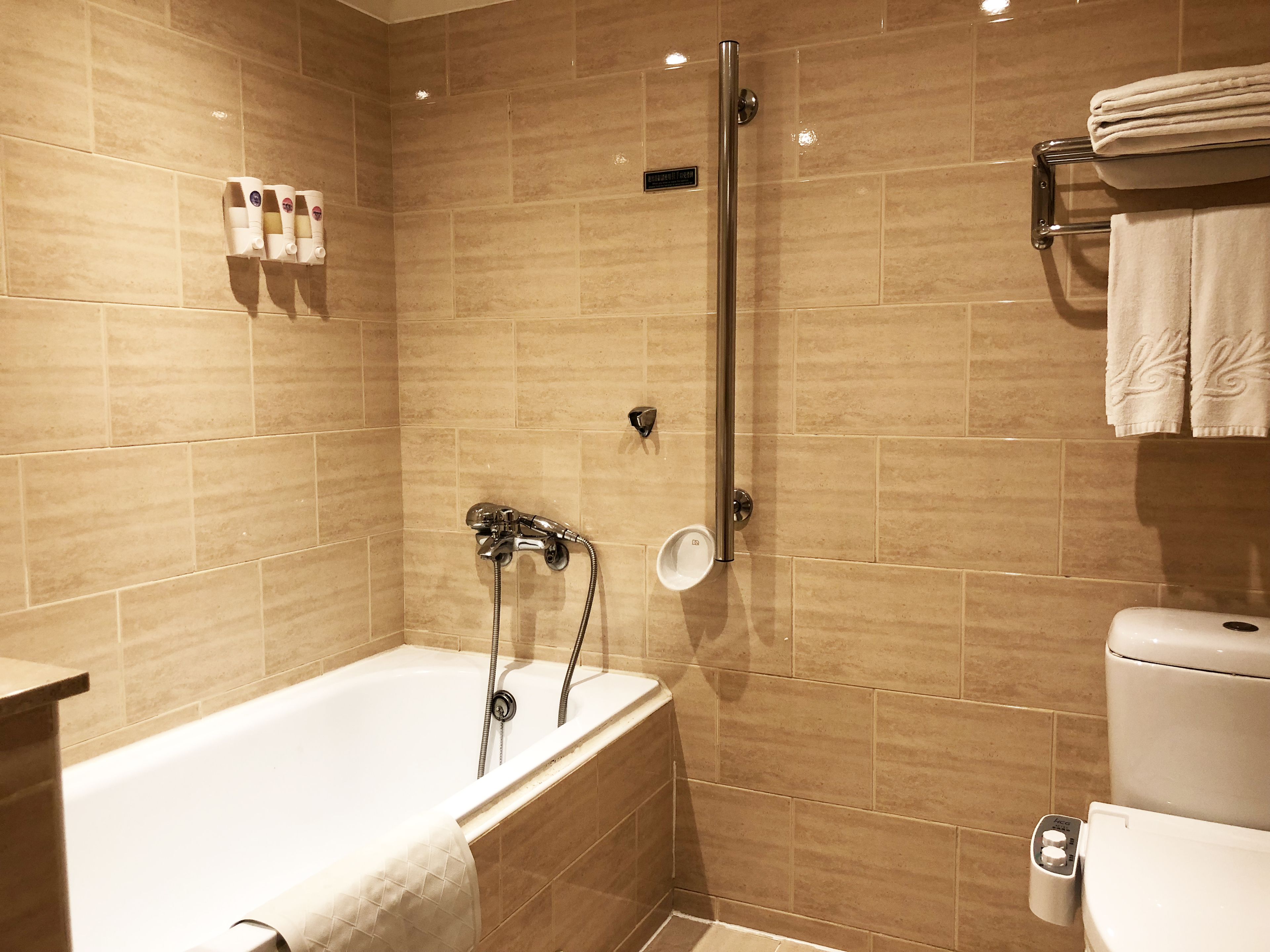 family quadruple room | bathroom | hair dryer, towels, shampoo, toilet paper