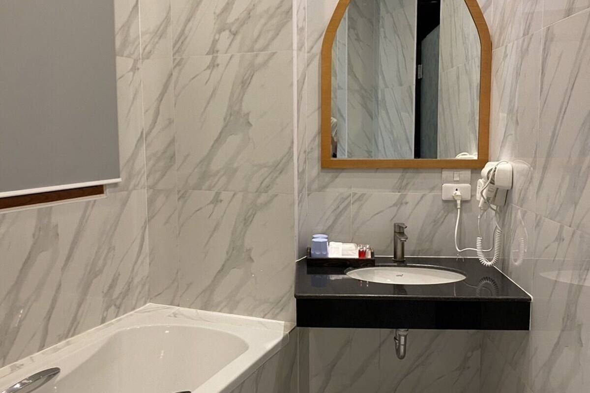 family villa, 2 bedrooms, private pool, hill view | bathroom | separate bathtub and shower, deep-soaking bathtub, free toiletries