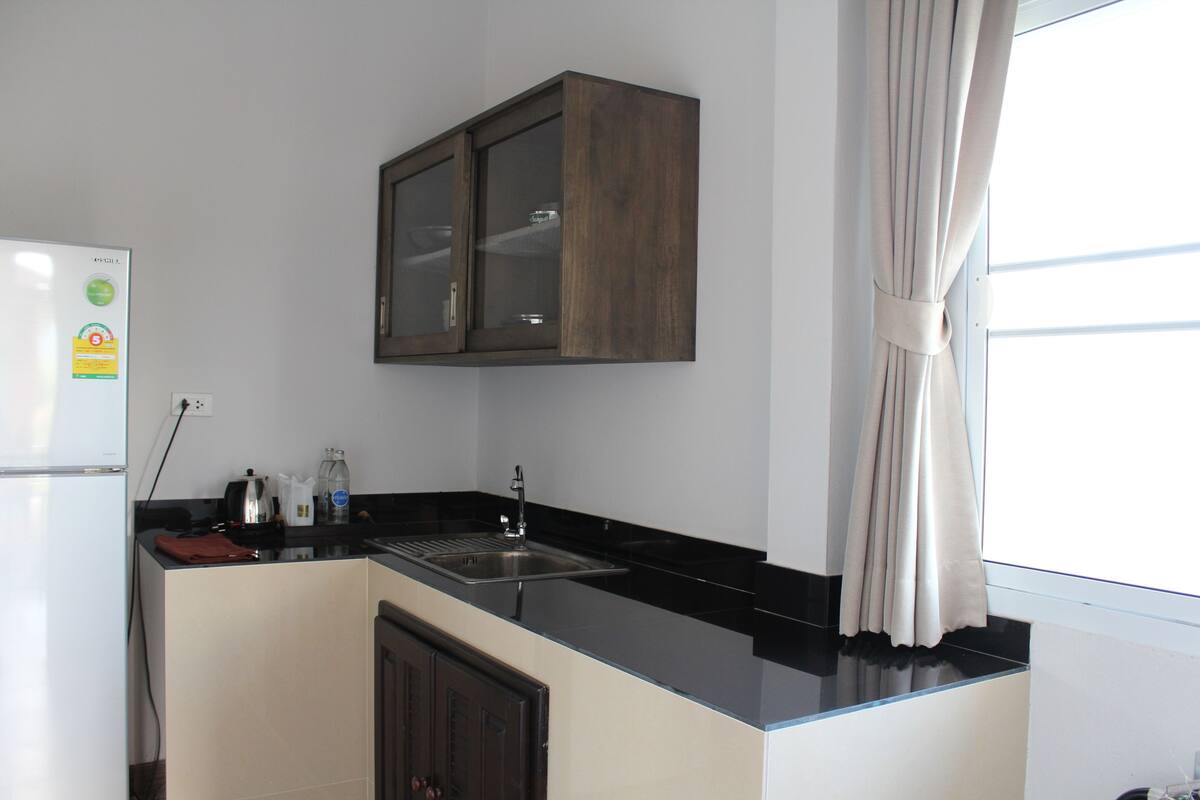 family villa, 2 bedrooms, mountain view, garden area | private kitchen | fridge, microwave, coffee/tea maker, electric kettle