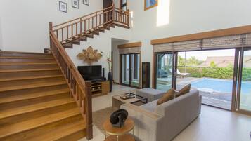 Exclusive Pool Villa | Living room | 32-inch LCD TV with satellite channels, TV