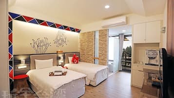 Twin Room | Living area | 22-inch LCD TV with cable channels, TV