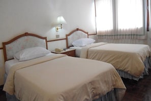 Habitación superior | Camas extra y wifi gratis