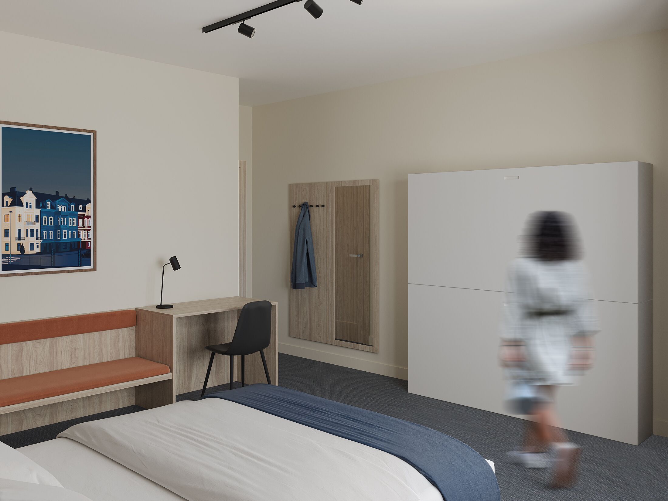 A modern hotel room with a bed, a desk, a chair, a wardrobe, and a painting on the wall.