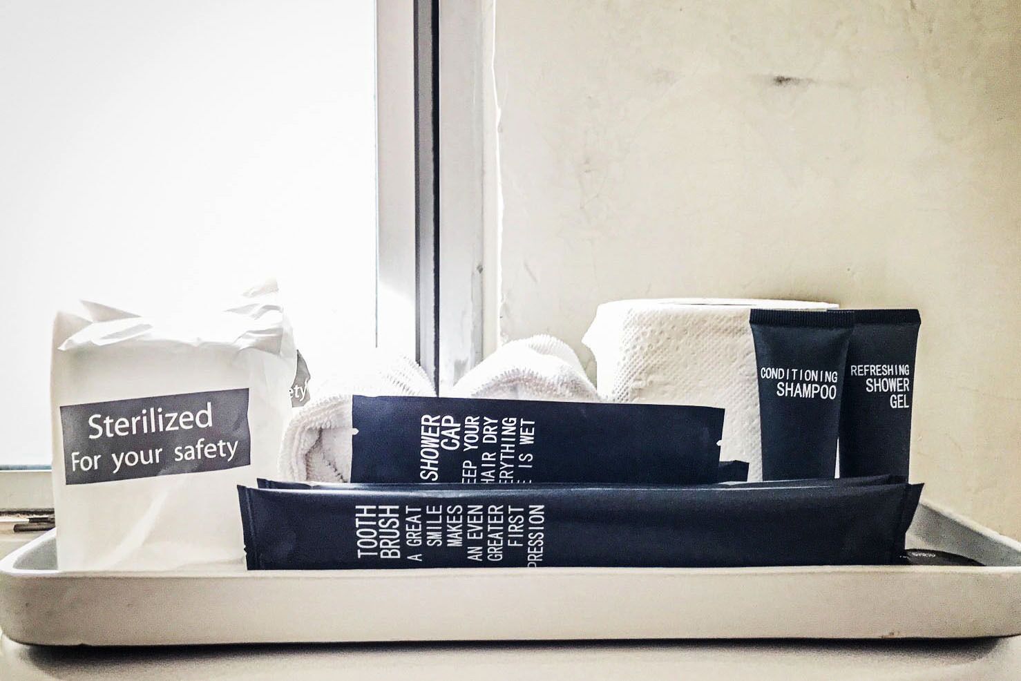 combined shower/bathtub, rainfall showerhead, designer toiletries