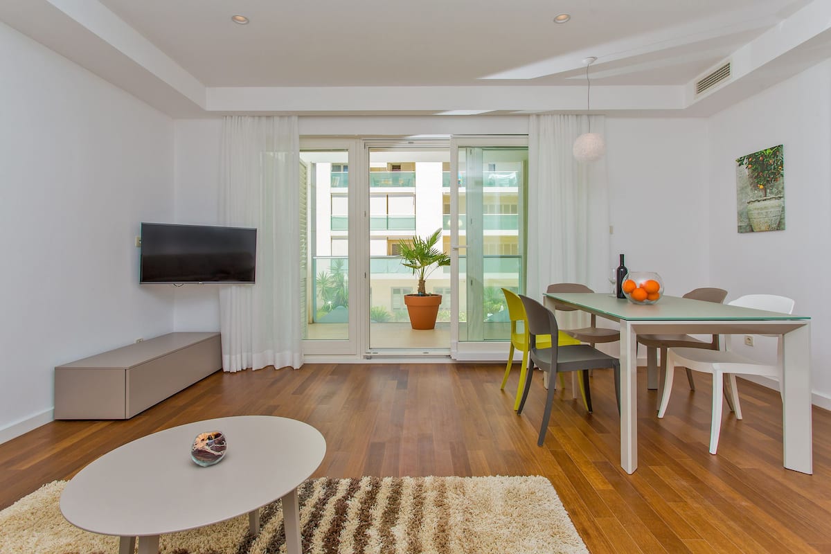 Deluxe Apartment, 1 Bedroom, Terrace, Garden View | Living area | LCD TV, heated floors