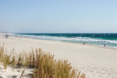On the beach, white sand, beach umbrellas